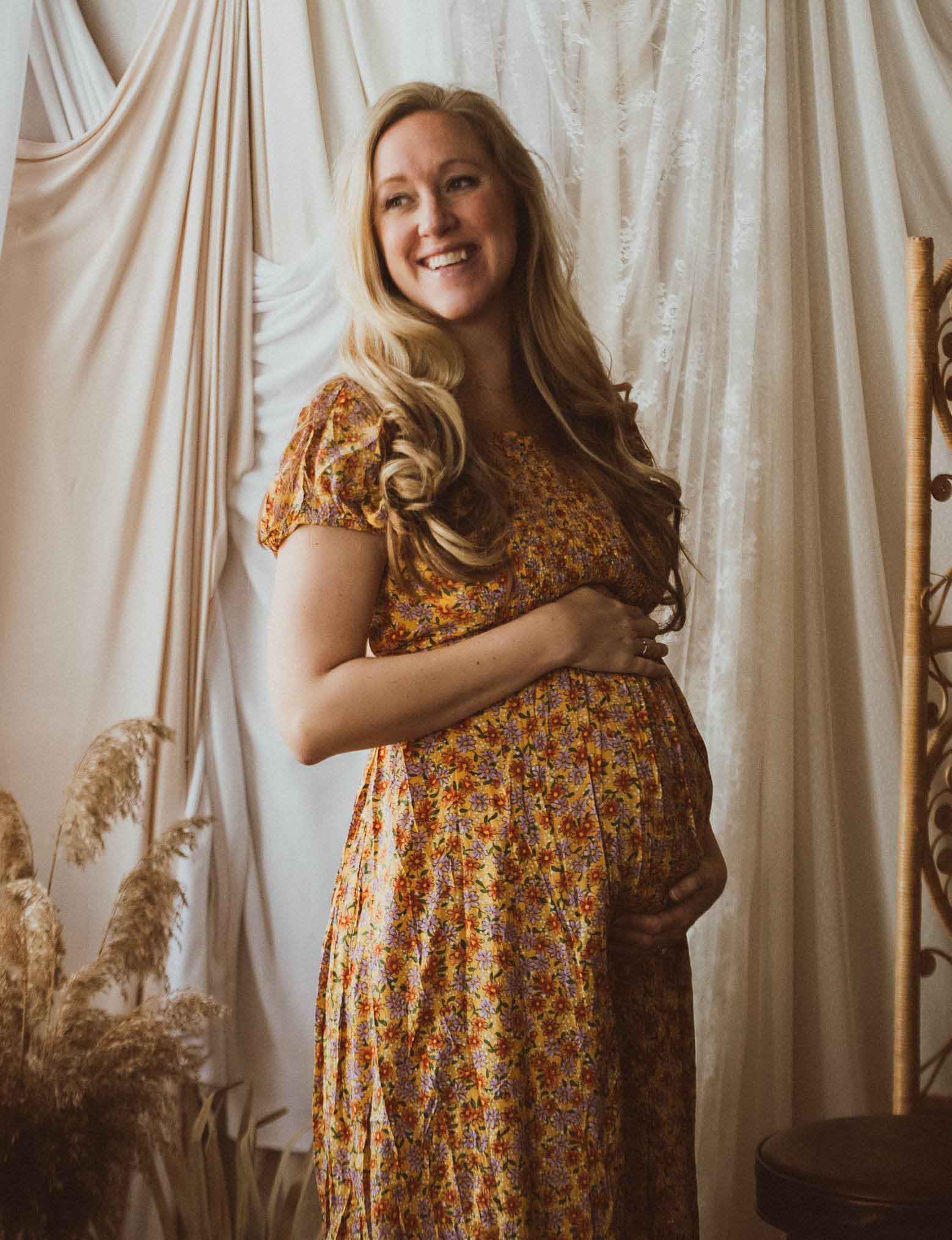 founder holding her pregnant belly